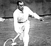 Rene Lacoste wearing the traditional long sleeve woven shirt.